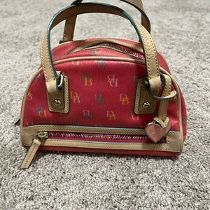 Used Donney and Bourke classic mini bag. Ideal for kids.